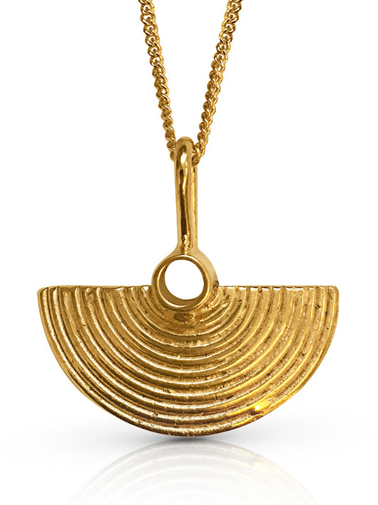 Gold finish half moon shaped pendant with fine lines texture on a fine curb chain made by ROKUS London. 